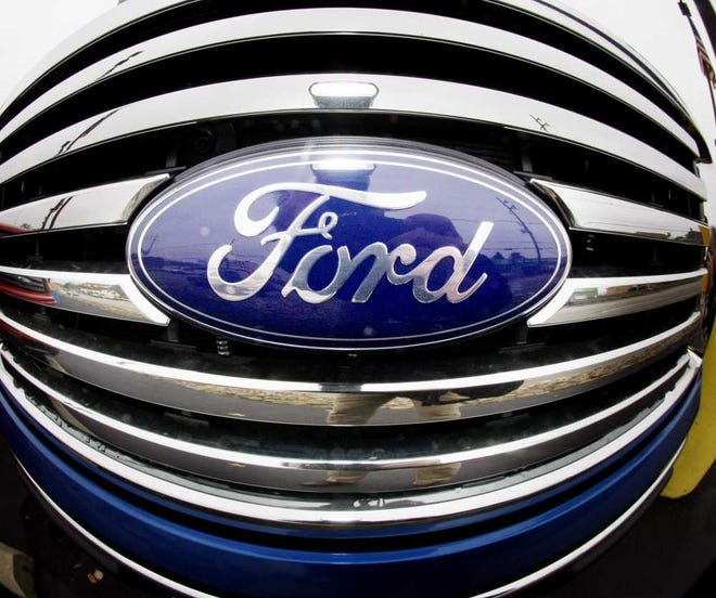 Associated Press The Fitch Ratings boost is a sign that Ford's recovery from near collapse is almost complete.