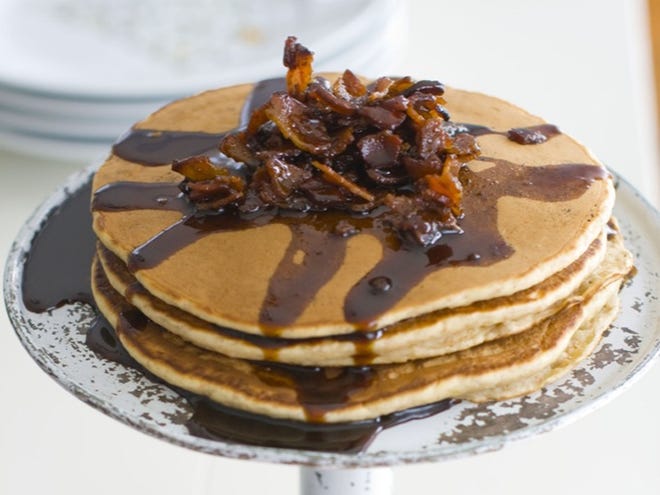 In this image taken on March 26, 2012, pancakes with molasses and honey used as a base are displayed in Concord, N.H.