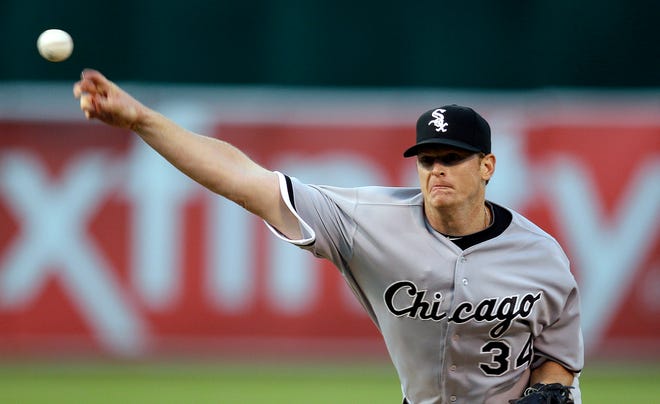 Chicago White Sox pitcher Gavin Floyd works against the Oakland Athletics during the first inning of a baseball game Tuesday, April 24, 2012, in Oakland, Calif.