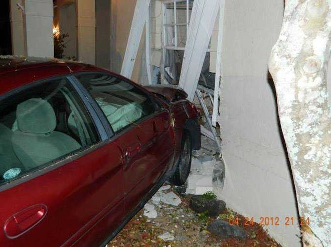 Flagler County Sheriff's deputies responded to a report of a vehicle crashing into a home in Palm Coast around 10 p.m. Tuesday.   Provided by the Flagler County Sheriff's Office