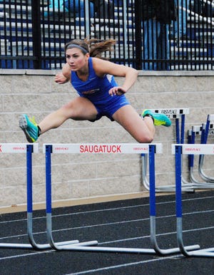 Saugatuck's Melissa Francis competes in the 100 meter hurdles on April 25, 2012.