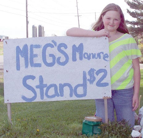 Meghan Geer, 13, makes good money at her manure stand in Hopewell.