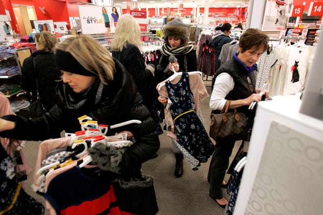 People shop the Jason Wu clothing and accessory collection Sunday, Feb. 5, 2012, at the East State Street Target in Rockford.
