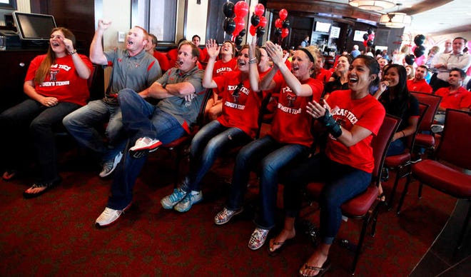 Members of the Texas Tech's women's tennis team cheers on Tuesday as they hear they will head to Miami for the first round of the NCAA women's tennis tournament.