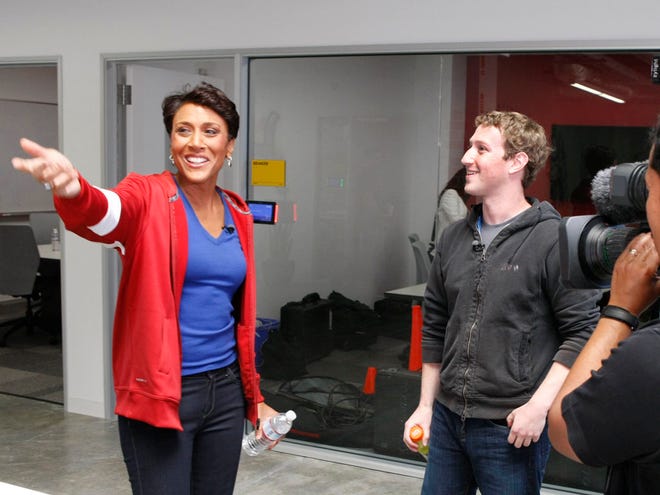 In this April 26, 2012 image released by ABC, Robin Roberts, host of "Good Morning America," left, talks to Mark Zuckerberg, the founder and CEO of Facebook, during an interview in Menlo Park, Calif., airing Tuesday, May 1, on "Good Morning America." Zuckerberg says U.S. and U.K. users will be able to enroll as organ donors via links on the world's biggest social networking site. Zuckerberg says his friendship with Apple Inc. co-founder Steve Jobs, who had received a liver transplant before he died last year, helped spur the idea. (AP Photo/ABC, Rick Rowell)