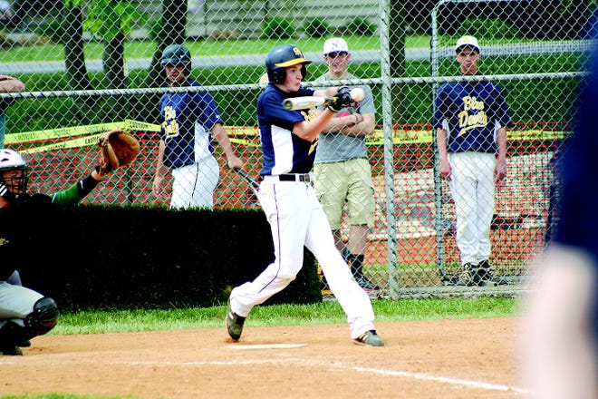 Corey Meyers punches the ball for a basehit.
