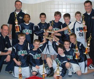 The CBAA Lightning won titles in the ICBA and Flemington basketball leagues. Team members include (front row, from left) coach Kevin Zosulis, Andy Hartman, David Bloom, Justin Hartwig, Tyler Young and Luke Zosulis. In the second row are coach Tom Hartman, Jordan Longino, Luke Traina, Jack Neri, Jack Duffy, David Zielke and coach T.J. Duffy.