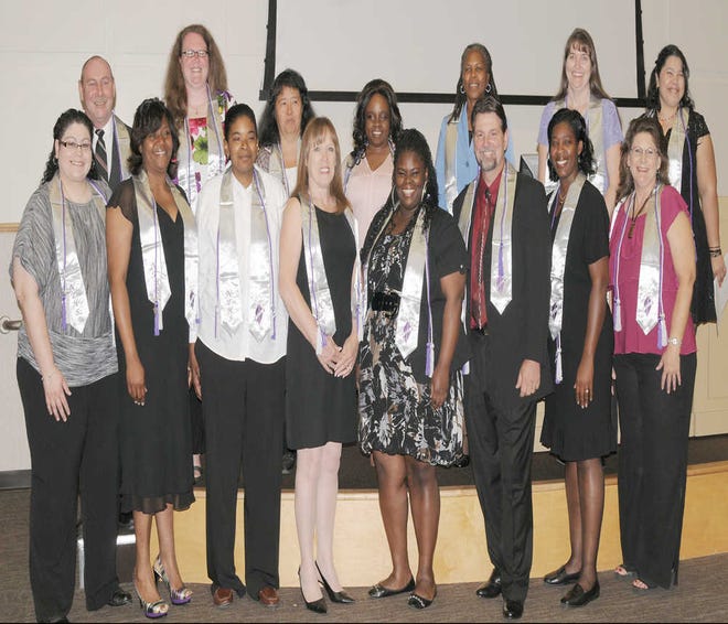 Savannah Technical College's National Technical Honor Society members were inducted in a ceremony on May 2. Pictured left to right: (back row) Ted Holmes, Mary Carson, Alice Powe, Katrina Sharpe, Francina Ware, Malinda Derington, Neyda Gomez; (front row): Mary Maynard, Tamika Knowles, Nakashala Wright, Denise O'Rourke, Joyce Johnson, Sheldon Schueler, Vickey McGirt, Donna Smith. Not pictured: Quentin Barnett, Claire Barnhill, Mary Brennan, Frederick Dixon, Robert Ford, Tiffaney Hollis, Roy Lintz, Christopher McLendon, Sara Morris, Keishon Nance, Jacquelyn Orr, Angela Real, Stuart Williams and Zatay'lauray Butler-Wright.