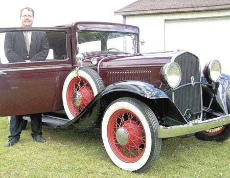 Mendon-area resident Jim Hart shows off his father’s 1931 Chrysler DeSoto, which features a hidden bootlegger tank under the driver's seat. Hart and his father, Lloyd, will continue their decades-long participation in the annual Mendon Dust-Off Sunday.