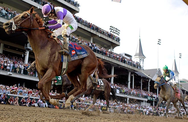 Jockey Mario Gutierrez rides I'll Have Another to victory in the 138th Kentucky Derby horse race at Churchill Downs Saturday, May 5, 2012, in Louisville, Ky. (AP Photo/David J. Phillip)
