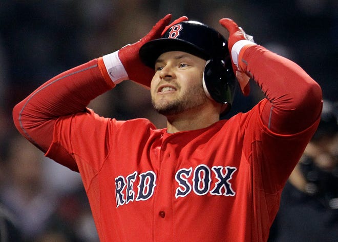 Cody Ross reacts after his hit was caught by Baltimore Orioles shortstop J.J. Hardy, who then doubled up David Ortiz at first base, in the eighth inning last night.