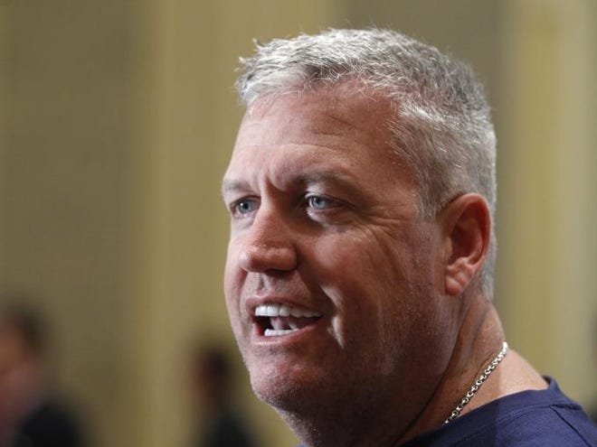 New York Jets Head coach Rex Ryan talks to a reporter during an interview at the NFL owners meeting in Palm Beach, Fla., Tuesday, March 27, 2012.