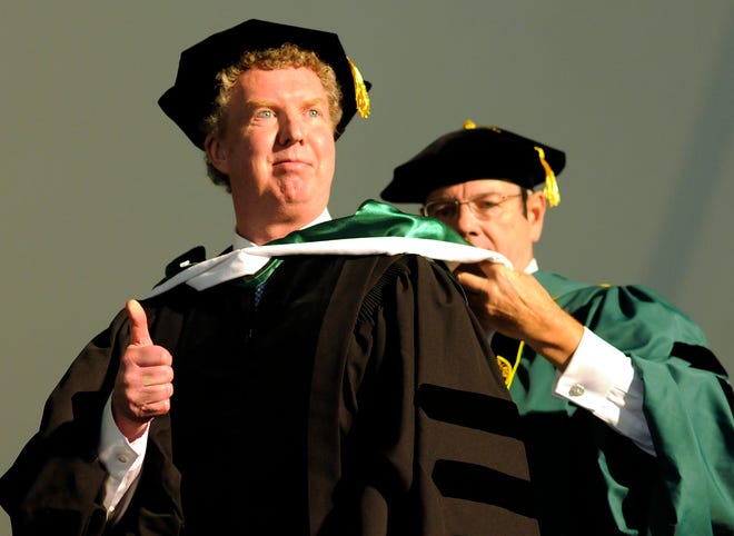 Sports columnist and author Dan Shaughnessy is awarded a doctor of humane letters honorary degree during commencement at Nichols College in Dudley.