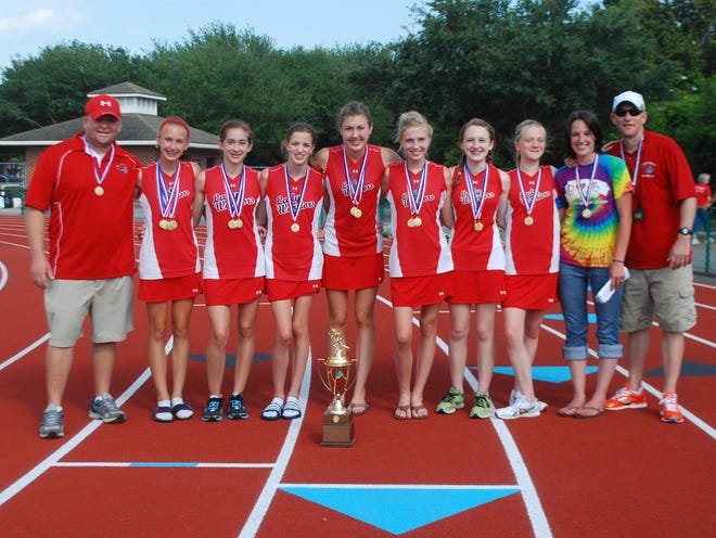 SCA’s girls track and field team poses after winning a fourth straight SCISA state title on Saturday.