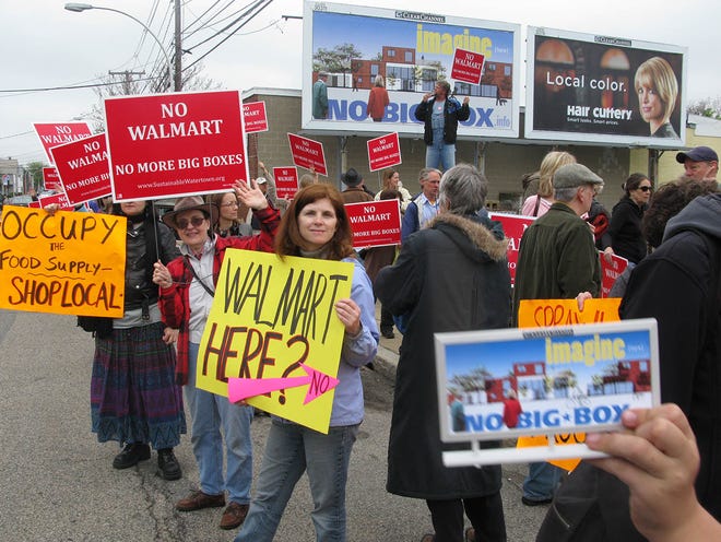 Demonstrators turned out May 5 to protest a proposal from Walmart for a 90,000-sq-ft retail and grocery store at 202 Arsenal Street in an event sponsored by Sustainable Watertown.