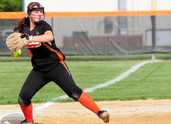 Freeport's Emily Bowen throws to first base for an out from third against Belvidere North Monday in Freeport.