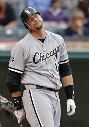 Chicago White Sox's A.J. Pierzynski reacts after striking out in the third inning against the Cleveland Indians on Tuesday in Cleveland. (AP Photo/Mark Duncan)
