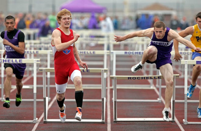 Oregon High School's Braden Barton (left) runs towards the finish just ahead of Rochelle's Kane Rodriguez in the 110-meter hurdles Tuesday, May 1, 2012, during the Ogle County Track Meet at Rochelle High School in Rochelle.