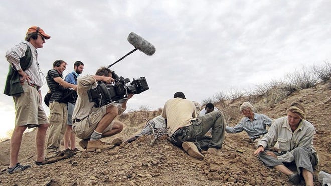 Filmmaker John Heminway, left, and a crew shoot the 'Bones of Turkana.’ The documentary will preview Monday at Four Arts.