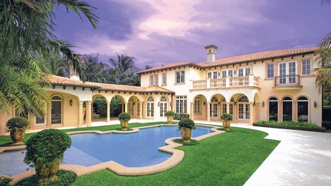 Built by Euro Homes in 2007, according to property records, a six-bedroom 'spec’ home at 211 Tangier Ave. has sold for $8.5 million to Bobby and Toni Holt Kramer. The pool area is a main focus of the home’s design, which includes the pool cabana, at left, connected by a breezeway to the main house.