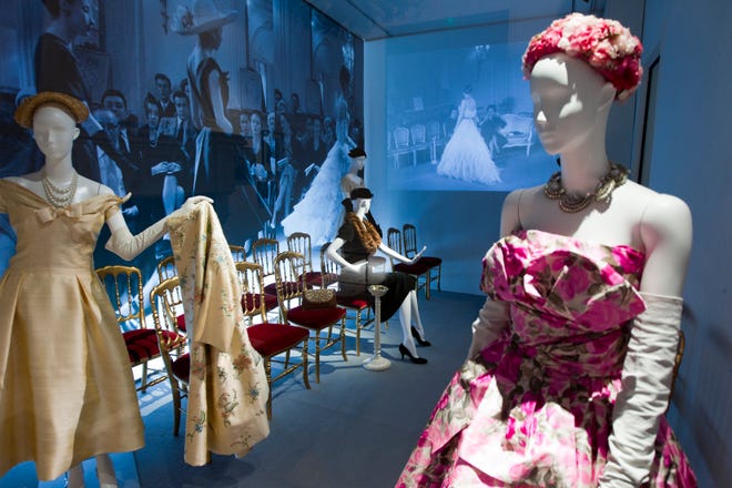 Mannequins in Christian Dior designs are seen at an exhibition at the childhood home of the designer in Granville, Normandy, France, on Thursday, May 10, 2012. Going back to where it all began, a new exhibit in the childhood home of legendary designer Christian Dior in Normandy sheds new light on the house's huge contribution to the silver screen.The setting also provides rare insight into how a young Dior -- a mama's boy who liked to spend time in the garden -- became inspired by the Granville landscape and decided to dedicate his life to fashion. (JACQUES BRINON, via AP)