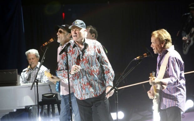 Original members of The Beach Boys, from left, Brian Wilson, David Marks, Mike Love and Al Jardine perform together during a concert at the Beacon Theater May 8 in New York.