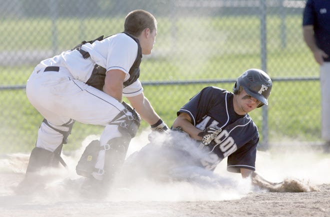 Louisville catcher Chad Neff applies the tag to Fairless’ Mike Durben for the final out in the top of the sixth inning of the Leopards’ 10-0 sectional final win Friday.