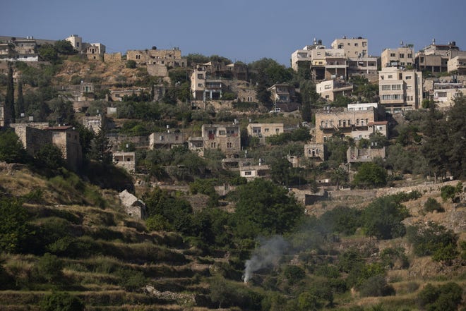 In this photo taken Sunday, May 6, 2012 a view of the West Bank village of Battir is seen. Residents of Battir, one of the last West Bank farming villages that still uses irrigation systems from Roman times say the village's ancient way of life is in danger as Israel prepares to lay down its West Bank separation barrier.(AP Photo/Sebastian Scheiner)