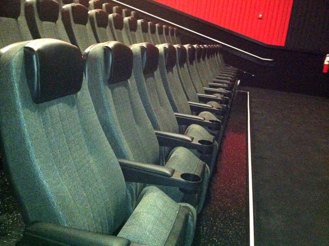 The seats in the newly renovated theaters at the Independence Mall literally rock in place.