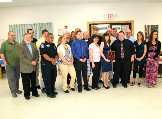 The Volunteer of the Year Award was presented to all the ambulance workers who responded to the July 19, 2011 fatal accident in Benton.