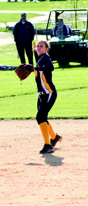Mackenzie Gayman throws from first from her shortstop position.