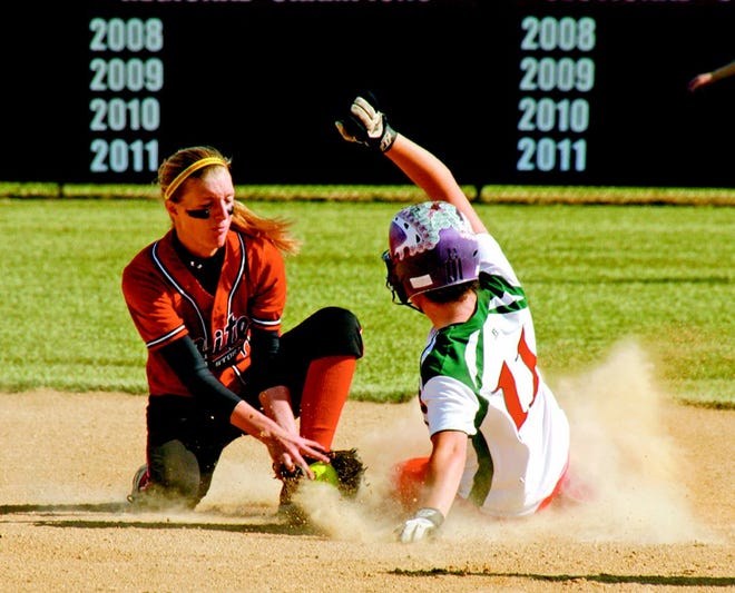 United High School's Michelle Ravel tries to make a tag at second base in a 1-0 loss to Abingdon at the United Regional.