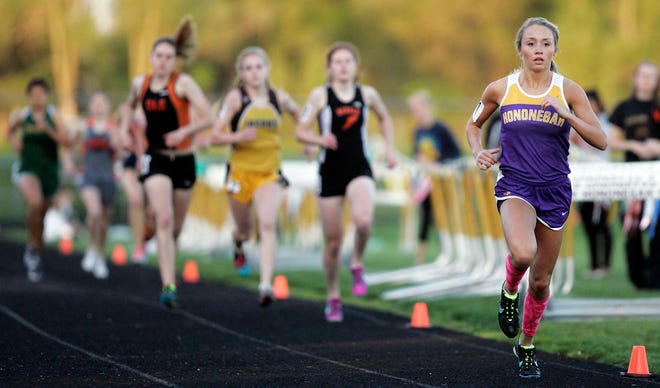 Hononegah's Courtney Clayton leads the pack after the first lap in the 800 meter run Thursday, May 10, 2012, during the Class 3A girls track sectional meet at Hononegah High School in Rockton.