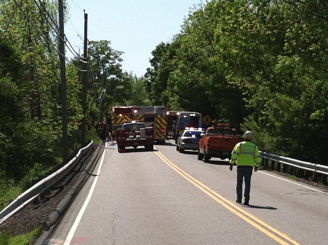 Officials respond to a crash Thursday afternoon on Route 82 in Bozah.