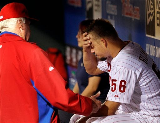 By Kevin Cooney/Staff writer 
 Philadelphia Phillies manager Charlie Manuel, left, talks with starting pitcher Joe Blanton after pulling him in the fifth inning of an interleague baseball game with the Boston Red Sox, Saturday, May 19, 2012, in Philadelphia. The Red Sox won 7-5.