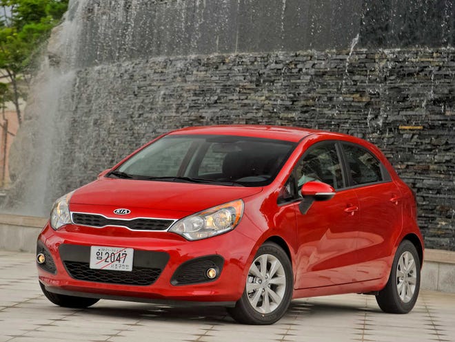 The Kia Rio once lagged behind the other guys like the Ford Fiesta, Hyundai Accent and Honda Fit. For 2012, it has been redesigned into a little tiger, with an aggressive new front end that wants to growl. The five-door hatchback is seen here; a photo of the sedan version is on Page 1.