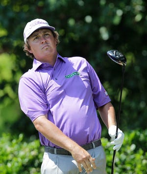Tournament leader Jason Dufner watches his tee shot on the first hole during Saturday's third round of the PGA Byron Nelson Championship in Irving.