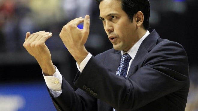 Miami Heat head coach Erik Spoelstra gestures to his team during the first half of Game 4 of their NBA basketball Eastern Conference semifinal playoff series against the Indiana Pacers, Sunday, May 20, 2012, in Indianapolis. (AP Photo/Darron Cummings)