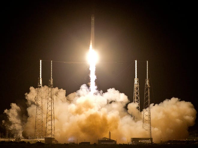 The Falcon 9 SpaceX rocket lifts off from space launch complex 40 at the Cape Canaveral Air Force Station in Cape Canaveral, Fla., early Tuesday, May 22, 2012. This launch marks the first time, a private company sends its own rocket to deliver supplies to the International Space Station. (AP Photo/John Raoux)