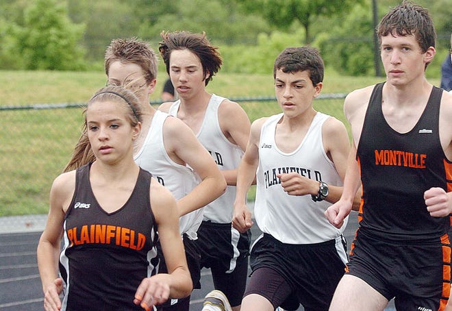 Plainfield’s Kerri Ruffo briefly runs ahead of the boys before beating the girls field in the 1,600 meters Tuesday during a meet against Montville in Plainfield. The Panthers girls won the meet, 98-52. The Indians won the boys meet, 76-59.