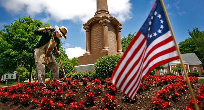 Eighty-year-old Richard Barry, chairman of the Norwell Beautification Committee, isn’t slowing down. He planted more than 200 begonias at the base of the Civil War Memorial on Norwell Town Common on Wednesday, May 23, 2012, just in time for Memorial Day.