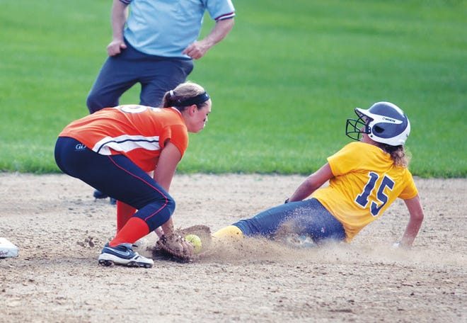Walpole shortstop Bridget Nicholson applies the tag to Norwood's Melissa Chisholm trying to steal second base on Wednesday.