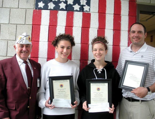 Pictured (left to right): Larry McNeill, AMVETS Americanism State Chairman, with Freshmen Erin Stephenson, first place trip to Freedoms Foundation,Valley Forge, Pa. Nicole Chiumento, second place $100, Richard Barnaby, LHS teacher.