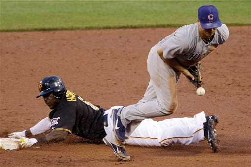 Pittsburgh Pirates' Josh Harrison, left, steals second as Chicago Cubs second baseman Darwin Barney has the throw from catcher Koyie Hill during the third inning of a baseball game in Pittsburgh Friday, May 25, 2012. The Pirates won 1-0. (AP Photo/Gene J. Puskar)