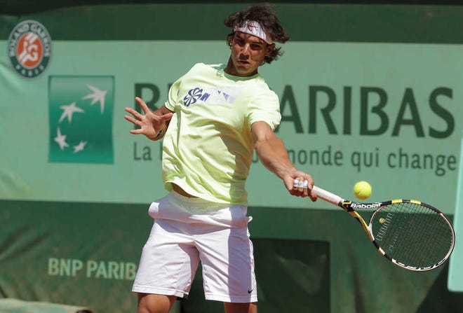 Defending champion, Spain's Rafael Nadal, trains for the French Open tennis tournament at the Roland Garros Stadium in Paris on Friday.