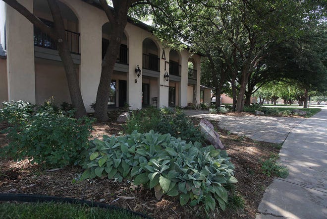 The Delta Gamma Lodge at Greek Circle has several examples of shade planting techniques for a west-facing structure.
