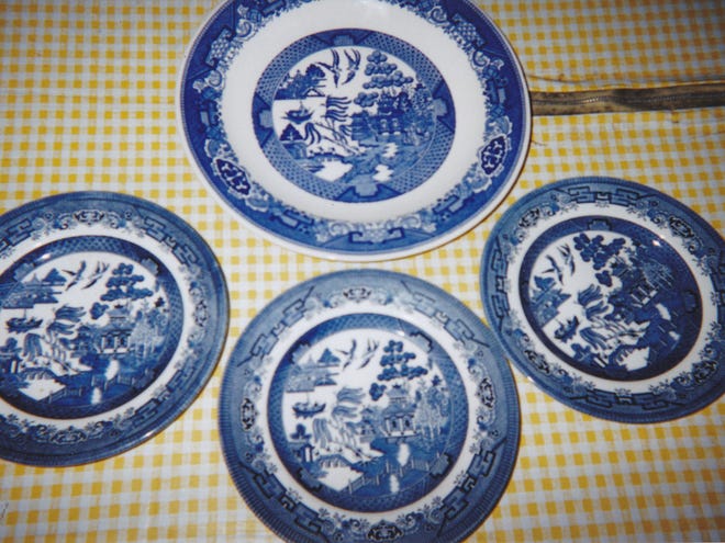 These blue transfer-printed plates are in the Blue Willow pattern. (Courtesy of John Sikorski)