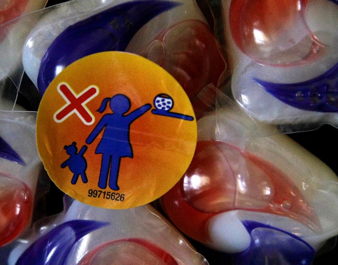 A warning label is attached to a package of Tide laundry detergent packets.
ASSOCIATED PRESS / PAT SULLIVAN