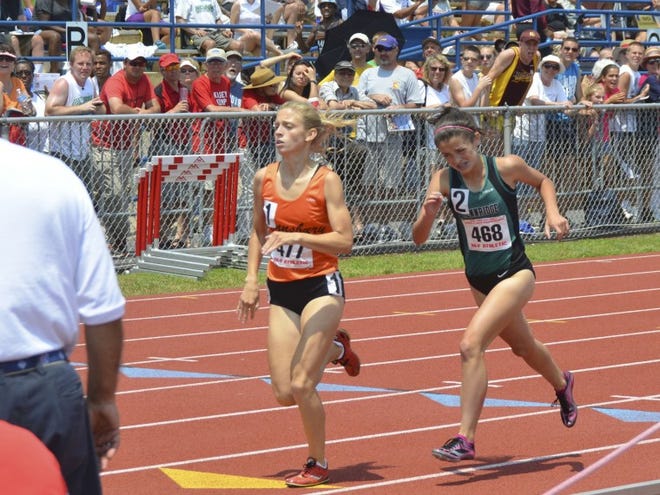 Sara Sargent of Pennsbury edges out Pennridge's Marissa Sheva for the PIAA Class AAA 1,600-meter track championship at Shippensburg University. Sheva would go on to beat Sargent at the Millrose Games trials and the two face each other again at the Millrose Games in New York.