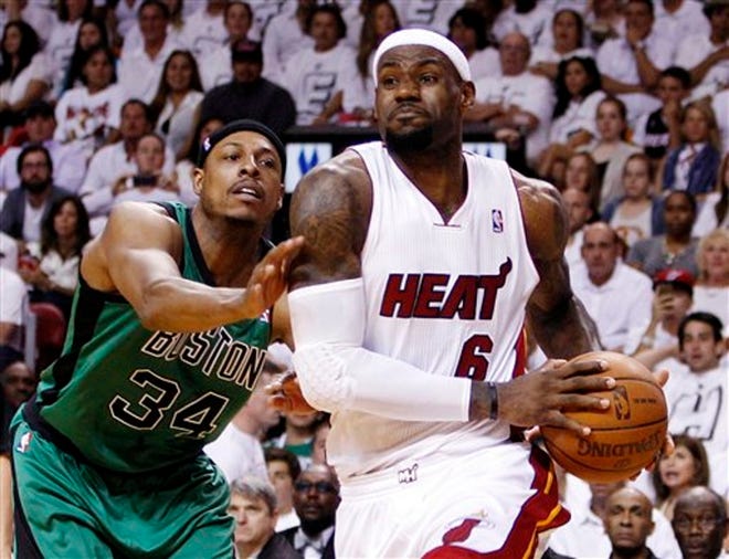 Miami Heat's LeBron James (6) drives to the basket against Boston Celtics' Paul Pierce (34) during the first half of Game 1 in their NBA basketball Eastern Conference finals playoffs series, Monday in Miami. (AP Photo/Lynne Sladky)